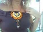 COLLANA A MEZZALUNA AD UNCINETTO
