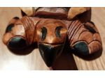 Scultura artigianale di una tartaruga realizzata in legno.
