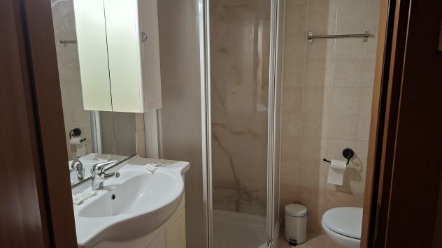Camera singola con bagno privato e angolo cottura