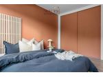 Appartamento con tre camere da letto e giardino