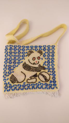 Mini borsa gialla con panda che gioca a palla