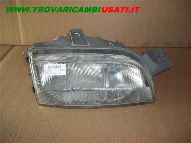 PROIETTORE D./REG.ALT(CARELLO) 2PARAB. FIAT PUNTO 75 / 90 / D / TD 999-U04363 Parti elettriche  Fanaleria  Proiettori  Proiettore ant. FIAT - PUNTO I