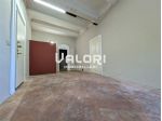 UFFICIO AL PIANO TERRA CON CANTINA E POSTO AUTO PRIVATO