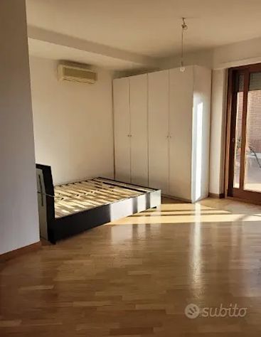 ACILIA ATTICO OPEN SPACE ARREDATO CON TERRAZZO PRIVATO.