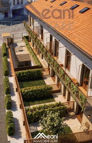 69 - A5_OP - 3 LOCALI CON 2 GIARDINI PRIVATI - NUOVA "RESIDENZA LE CORTI" - Foto 3