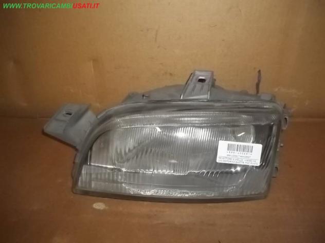 PROIETTORE S.(HELLA, -06/95) H4 CON MOTORINO ELETTR. FIAT PUNTO (NV/1A/NW) 55 / 60 / 85 / GT  Parti elettriche  Fanaleria  Proiettori  Proiettore ant.