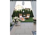 TRILOCALE AL PIANO TERRA CON GIARDINO PRIVATO