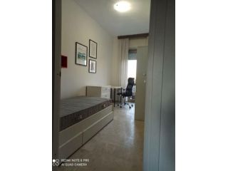 Camere luminose con balcone privato