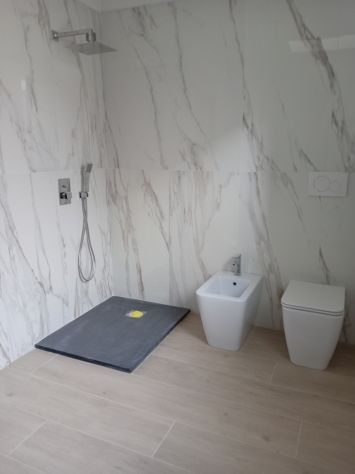 Opere edili, bagni e impianti certificato