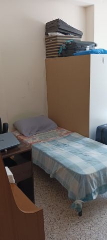 letto singolo in camera doppia