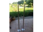 Due candelabri in acciaio a terreno