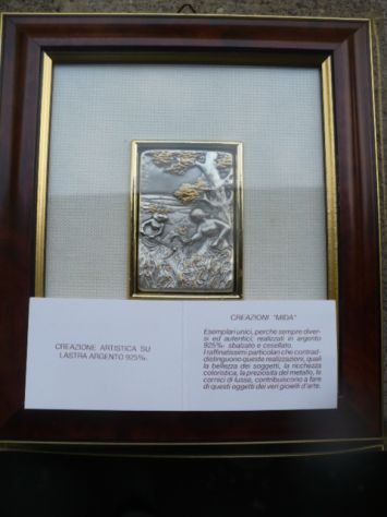 quattro quadretti in rilievo in argento