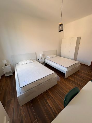 Trilocale ristrutturato con balcone e posto auto - Foto 10