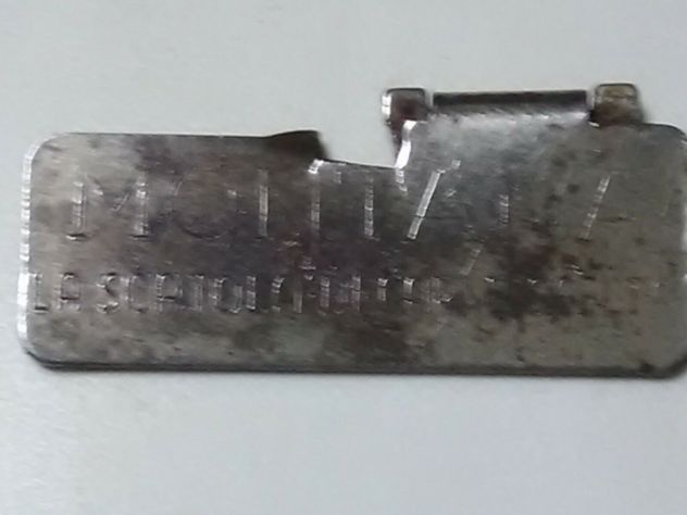 VECCHIO APRI SCATOLE IN METALLO ANNO 1940