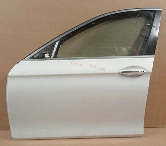 PORTA ANT. SX BIANCA C/ALZ. E SERR. - EX U1295994 999-U1305196 Carrozzeria  Lamierati esterni  Porte  Porta ant. sx. BMW - Serie 5 F10 4 porte - 01-02