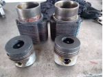 Due cilindri e due pistoni completi di fasce con diametro originale da mm 90 in