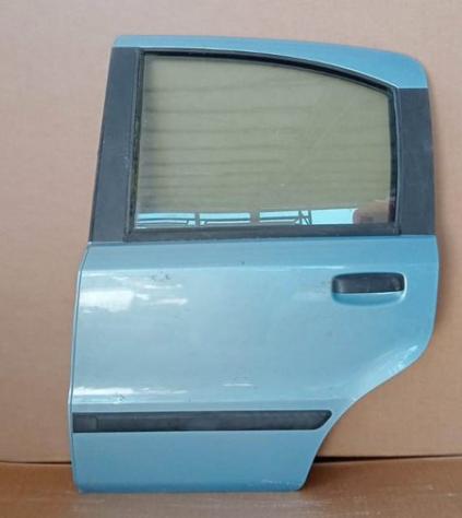 PORTA POST.S. AZZURRO MET. C/ALZ. MAN. E SERR.  Carrozzeria  Lamierati esterni  Porte  Porta post. sx. FIAT - PANDA - 01-09-2003 - 01-12-2011, FIAT -