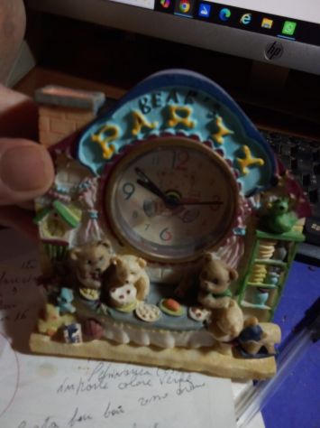 SVEGLIETTA INSERITA IN CASETTA CERAMICA PREGIATA