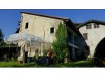 Porzione di casa con giardino