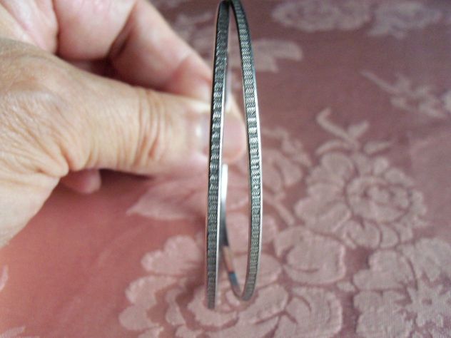 Braccialetti e porta chiavi in argento. - Foto 3