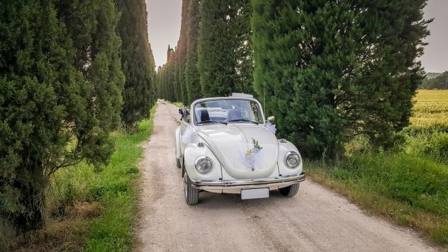 Noleggio Maggiolino cabrio bianco