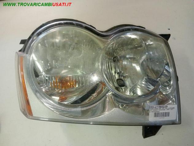 PROIETTORE ANT. DX ( DA LUCIDARE) 999-U1560229 Parti elettriche Fanaleria Proiettori Proiettore ant. JEEP - GRAND CHEROKEE - 2005 2011