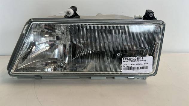 PROIETTORE SX (CONCO) 999-U1305811 Parti elettriche  Fanaleria  Proiettori  Proiettore ant. LANCIA - DEDRA BERLINA - 01-05-1989 - 01-09-1994, LANCIA -