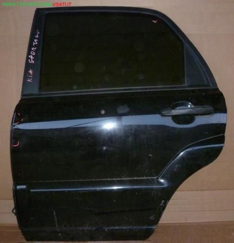 PORTA POST.S. NERO MET. C/ALZ. E SERR. (2 Bulli)  Carrozzeria  Lamierati esterni  Porte  Porta post. sx. KIA - SPORTAGE - 01-02-2004 - 01-08-2010