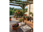 Appartamento con giardino in bifamiliare