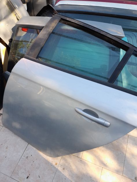 Sportello posteriore sx grigio x Fiat Bravo anno 2008