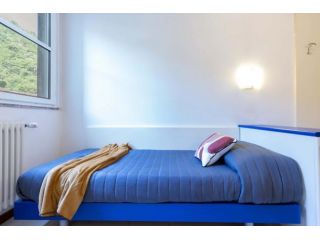 Stanza singola con bagno condiviso