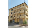 Appartamento con magazzino commerciale