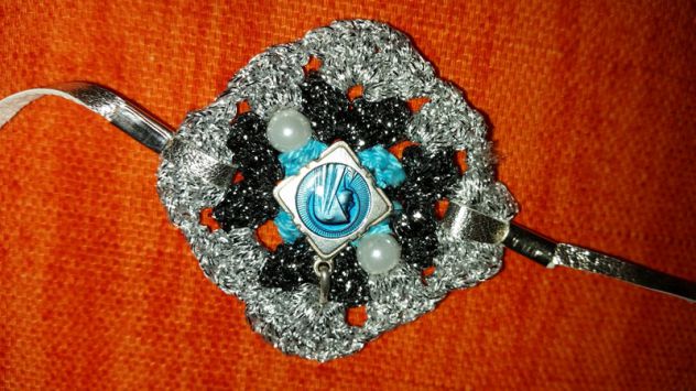 BRACCIALE TRICOT CON CIONDOLO - Foto 5