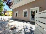 APPARTAMENTO NUOVO CON GIARDINO E GARAGE