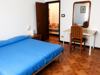 Stanza in appartamento in affitto a Bologna