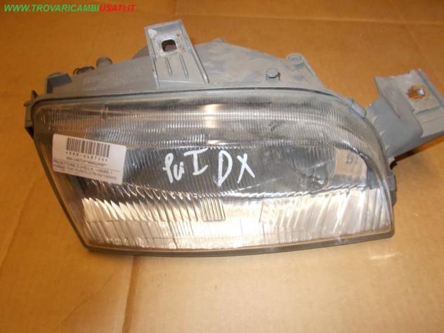 PROIETTORE D.(HELLA, -06/95) 1 PARAB. FIAT PUNTO (176-NV/1A/NW) 55 / 60 / 85 / GT  Parti elettriche  Fanaleria  Proiettori  Proiettore ant. FIAT - PUN