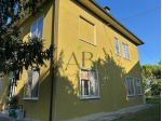 Casa con giardino