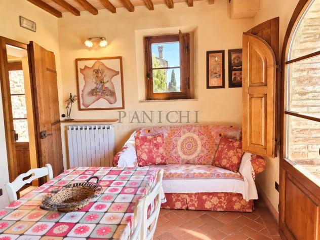 Appartamento rustico con terrazza panoramica e piscina comune - Foto 11