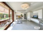 Splendido BILOCALE con GIARDINO PRIVATO, TAVERNA E BOX AUTO